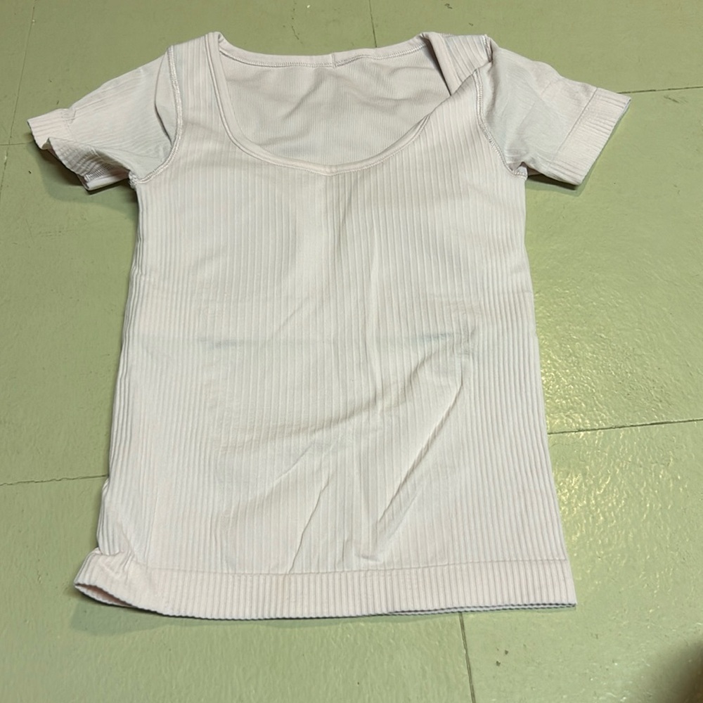 Lululemon strawberry milkshake. Size 2. EBB to street top padding included.